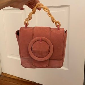 Small bag with adjustable strap
